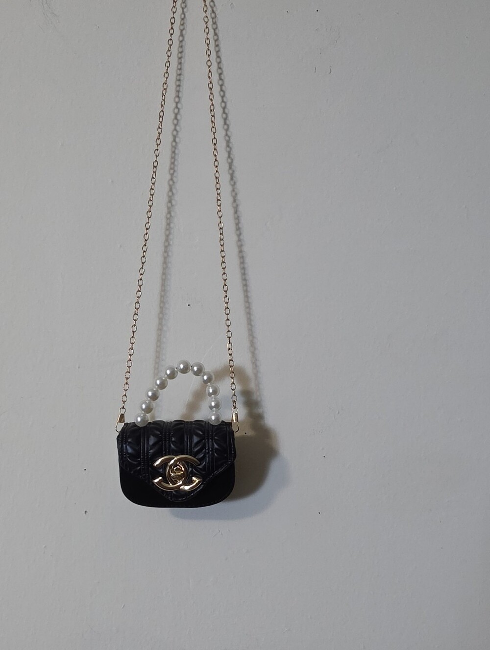 Black Quilted Pearl-Handle Mini Shoulder Bag with Gold Hardware Crossed Body